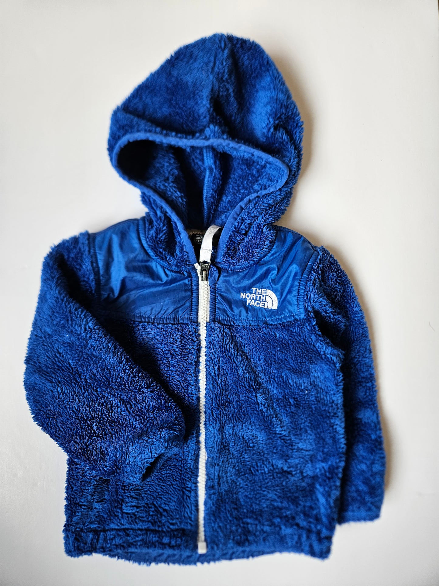 The North Face blue zip-up sweater size 12 to 18m